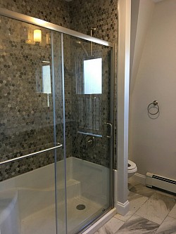 New custom tiled shower after bathroom remodel 