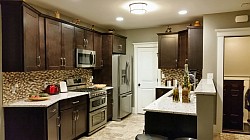 AFTER kitchen renovation (window eliminated, kitchen pulled forward to create pantry space)