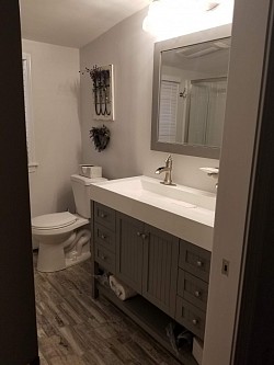 AFTER -new remodeled modern farmhouse style bathroom 